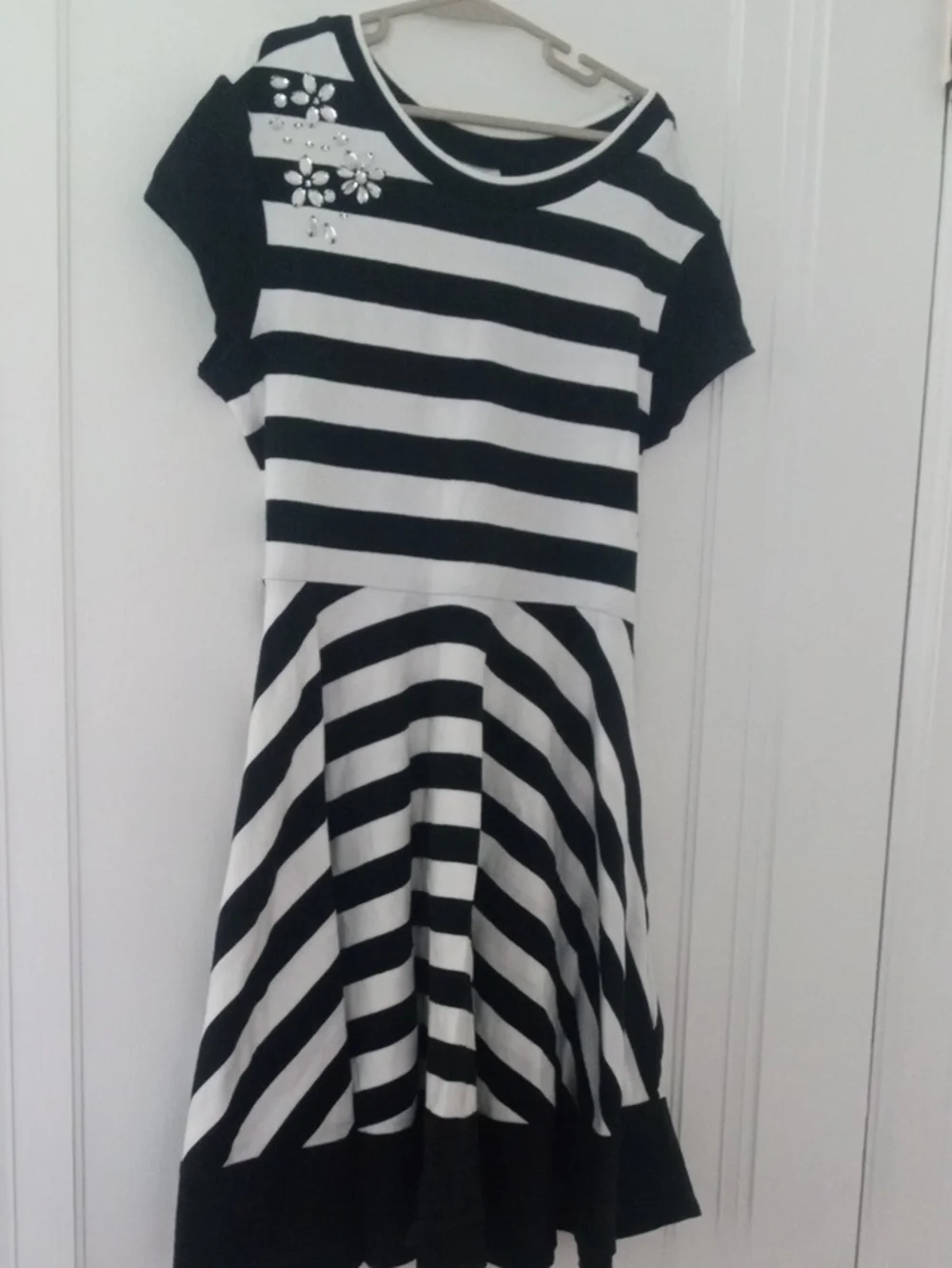 girls 12 black white striped dress, jeweled accent at chest  Justice